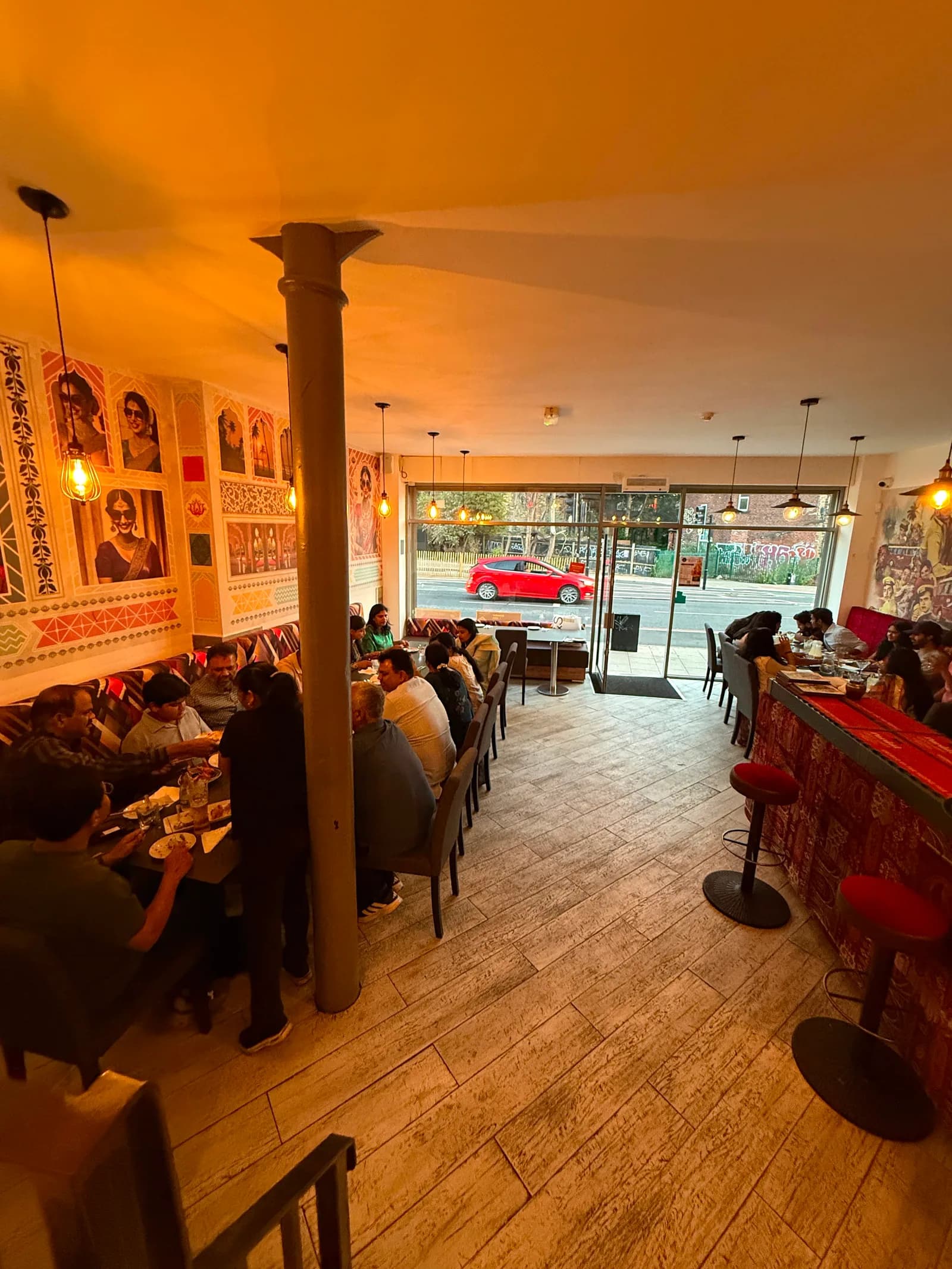 A busy evening in the Bombay 2 Goa dining room, looking out to Headingley Lane